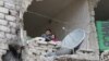 В оточеному місті Алеппо продовжуються бої між сирійськими військами і повстанцями