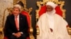 U.S. Secretary of State John Kerry, left, sits with Sultan of Sokoto Sa'adu Abubakar during a visit to the sultan's palace in Sokoto, Nigeria, Aug. 23, 2016.
