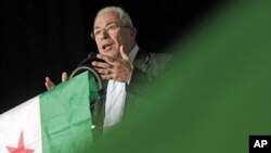 Syrian National Council leader Burhan Ghalioun gives a speech during a Syrian opposition rally in Vienna, December 8, 2011.