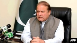 An handout picture released by the Pakistan Press Information Department (PID), March 28, 2016, shows Pakistan's Prime Minister Nawaz Sharif addressing the nation at his office in Islamabad.