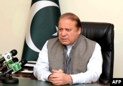 FILE - An handout picture released by the Pakistan Press Information Department (PID), March 28, 2016, shows Pakistan's Prime Minister Nawaz Sharif addressing the nation at his office in Islamabad.