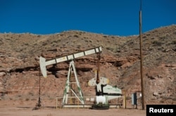 Oil pump jacks are seen near Aneth, Utah, Oct. 29, 2017.