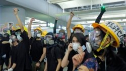 VOA连线（汤惠芸）：香港元朗西铁站无差别攻击3个月 市民蒙面静坐抗议