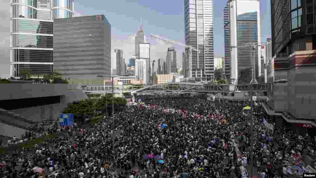 Protesters block the main road to the financial Central district in Hong Kong, Sept. 29, 2014. 