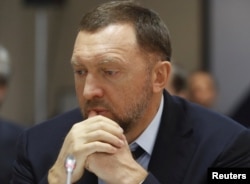 FILE - Oleg Deripaska attends an agreement signing ceremony with the Krasnoyarsk region's government in Moscow, Dec. 12, 2017.