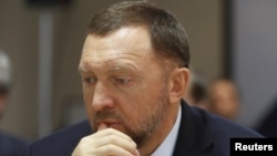 FILE - Oleg Deripaska attends an agreement signing ceremony with the Krasnoyarsk region's government in Moscow, Russia, Dec. 12, 2017.