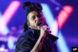 The Weeknd performs at the 2015 We Can Survive Concert at the Hollywood Bowl on Oct. 24, 2015, in Los Angeles.