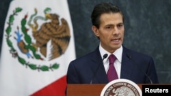 FILE - Mexico's President Enrique Pena Nieto speaks at the Los Pinos official residence in Mexico City, Aug. 27, 2015.