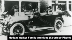 Madam C.J. Walker and her daughter A'Lelia Walker in their car.