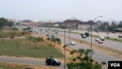 Abuja's meticulously planned city center began developing in the 1980s when officials decided to name the city Nigeria's new capital. The city is in central Nigeria making it accessible to both north and south. (Heather Murdock for VOA)