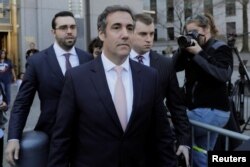 FILE - U.S. President Donald Trump's personal lawyer Michael Cohen departs federal court in the Manhattan borough of New York, April 26, 2018.