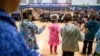 President Barack Obama attends a performance by native Alaskan dancers at Dillingham Middle School, in Dillingham, Alaska, Sept. 2, 2015.