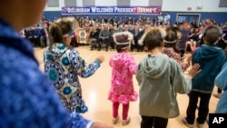 President Barack Obama attends a performance by native Alaskan dancers at Dillingham Middle School, in Dillingham, Alaska, Sept. 2, 2015.