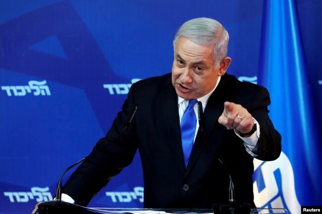 FILE - Israel's Prime Minister Benjamin Netanyahu gestures as he speaks during a news conference in Jerusalem, April 1, 2019.