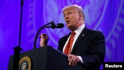 President Donald Trump speaks to the national convention of the American Legion in Reno, Nevada, Aug. 23, 2017.