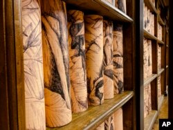 A view of the Vatican Apostolic Library, Monday, November 8, 2021, during the media presentation of the exhibition 'Tutti' inside the Apostolic Library. (AP Photo/Nicole Winfield)