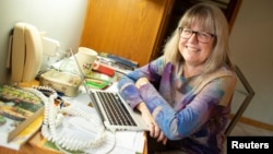 Donna Strickland speaks on the phone after winning the Nobel Prize for Physics