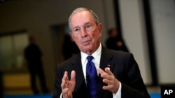 FILE - Michael Bloomberg addresses the media at the One Planet Summit, near Paris, Dec. 12, 2017. 