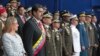 Photo provided by the Miraflores Presidential Palace shows President Nicolas Maduro, second from left, and first lady Cilia Flores during a event marking the 81th anniversary of the National Guard, in Caracas, Venezuela, Aug. 4, 2018. 