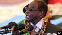 Zimbabwean President Robert Mugabe delivers his speech during a ceremony to honor thousands of fighters who died in the 1970s Bush war against colonialism, in Harare, Aug. 10, 2015.