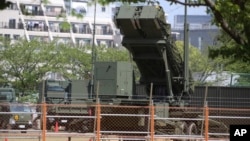FILE - A Patriot missile unit is seen in Tokyo, April 29, 2017. The United States deployed a battery of Patriot long-range anti-aircraft missiles in Lithuania to be used in NATO war games Tuesday.