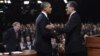 美国共和党总统候选人罗姆尼和美国总统奥巴马举行首场辩论后握手