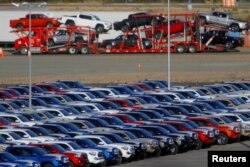 FILE PHOTO - Newly assembled vehicles are seen at a stockyard of the automobile plant Toyota Motor Manufacturing of Baja California in Tijuana, Mexico, April 30, 2017.