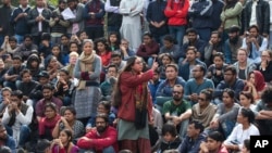 A student makes her speech as Jawaharlal Nehru University students gather for a protest against the arrest of a student union leader in New Delhi, India, Feb. 15, 2016.