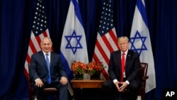 Fira Ministan Isra'ila, Benjamin Netanyahu (daga hagu) shugaban Amurka, Donald Trump (daga dama)