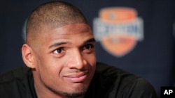 Missouri senior defensive lineman Michael Sam speaks to the media during an NCAA college football news conference in Irving, Texas, Jan. 1, 2014.