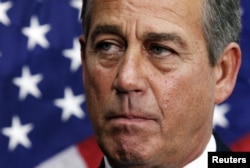 U.S. House Speaker John Boehner (R-OH) pauses during a news conference on the fiscal cliff after a closed GOP meeting at Capitol Hill in Washington, December 5, 2012.