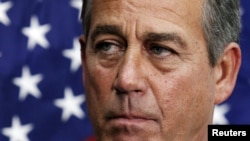 U.S. House Speaker John Boehner (R-OH) pauses during a news conference on the fiscal cliff after a closed GOP meeting at Capitol Hill, December 5, 2012.