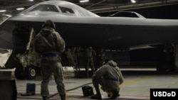 Airmen from the 509th Bomb Wing at Whiteman Air Force Base, Missouri prepare B-2 Spirit stealth bombers for operations near Sirte, Libya.