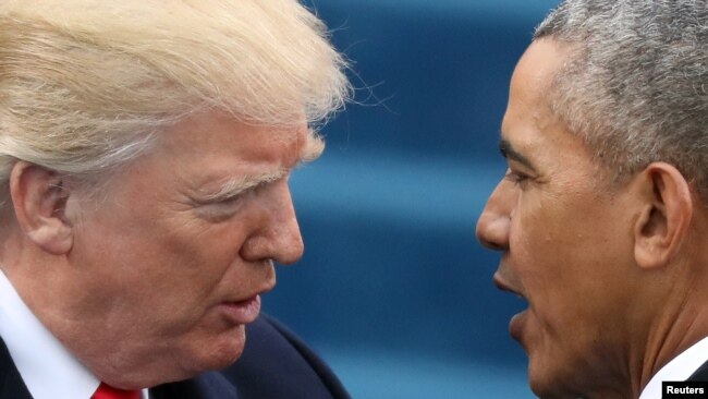 Tổng thống Trump và ông Obama tại lễ nhậm chức hôm 20/1.