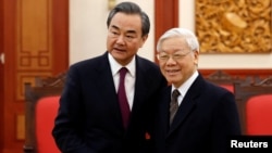 Bộ trưởng Ngoại giao Trung Quốc Vương Nghị gặp Tổng bí thư Nguyễn Phú Trọng tại Hà Nội, ngày 2/4/2018.