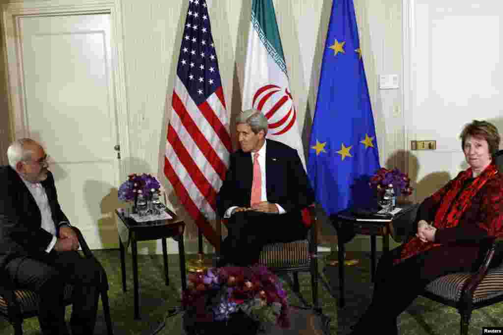 U.S. Secretary of State John Kerry and European Union High Representative for Foreign Affairs Catherine Ashton and Iranian Foreign Minister Mohammad Javad Zarif participate in a trilateral meeting at the Waldorf Astoria hotel in New York, Sept. 26, 2014.