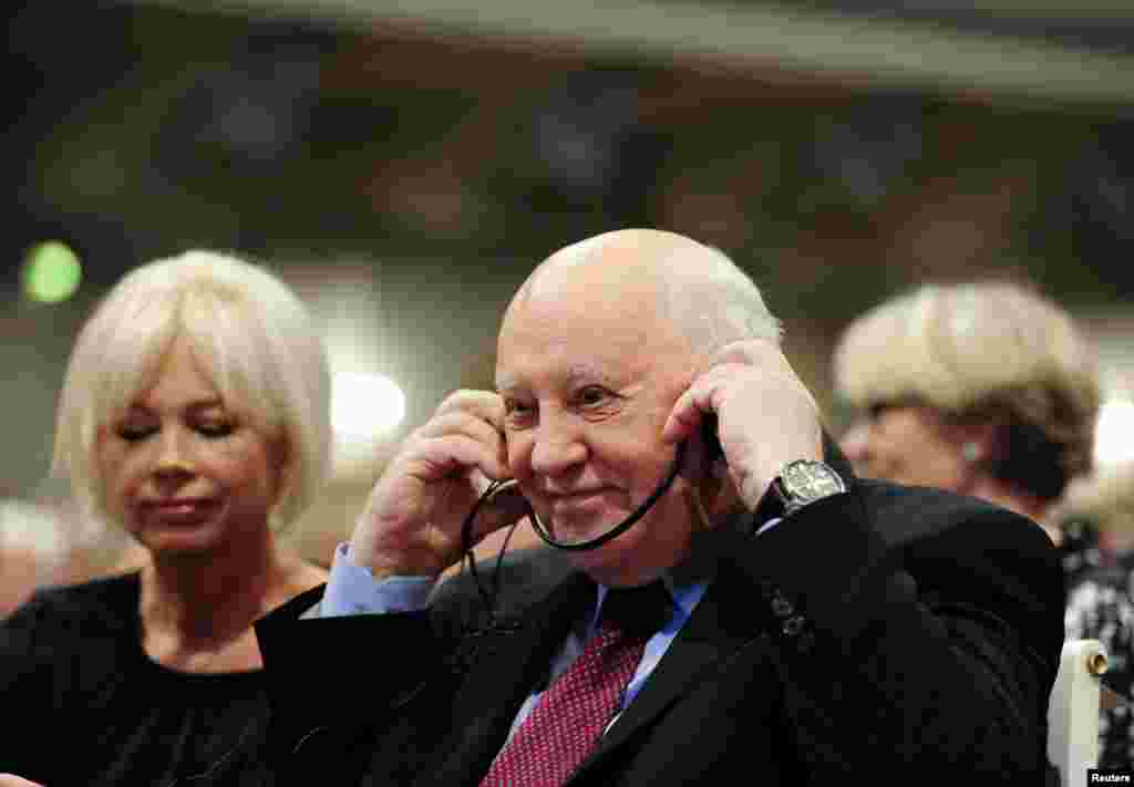 Former Soviet leader Mikhail Gorbachev and his daughter Irina Virganskaya attend a ceremony organized by the Berlin Senate to mark the 25th anniversary of the fall of the Berlin Wall at the Gendarmenmarkt concert house in Berlin, Germany.