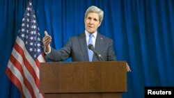 U.S. Secretary of State John Kerry delivers remarks during a news conference at the U.S. Embassy in London, Dec. 16, 2014.