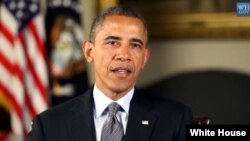 President Barack Obama is seen delivering his weekly address in this White House video screen grab.