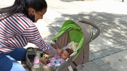 A mother with her baby in Venezuela.