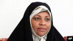 This undated photo provided by Iranian state television's English-language service, Press TV, shows its American-born news anchor Marzieh Hashemi.