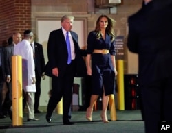 President Donald Trump and first lady Melania Trump walk to their vehicle after visiting the Washington hospital where House Majority Leader Steve Scalise was taken after being shot in Alexandria, Va., June 14, 2017.