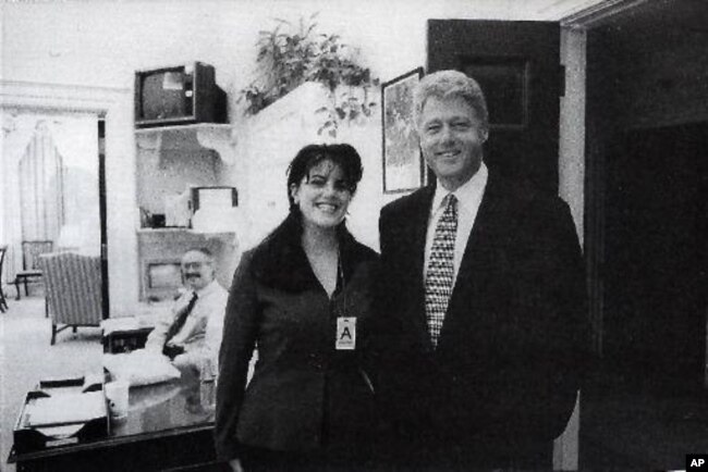 FILE - Official White House photo from Independent Counsel Kenneth Starr's report on Clinton, showing the president and Monica Lewinsky at the White House in 1995.