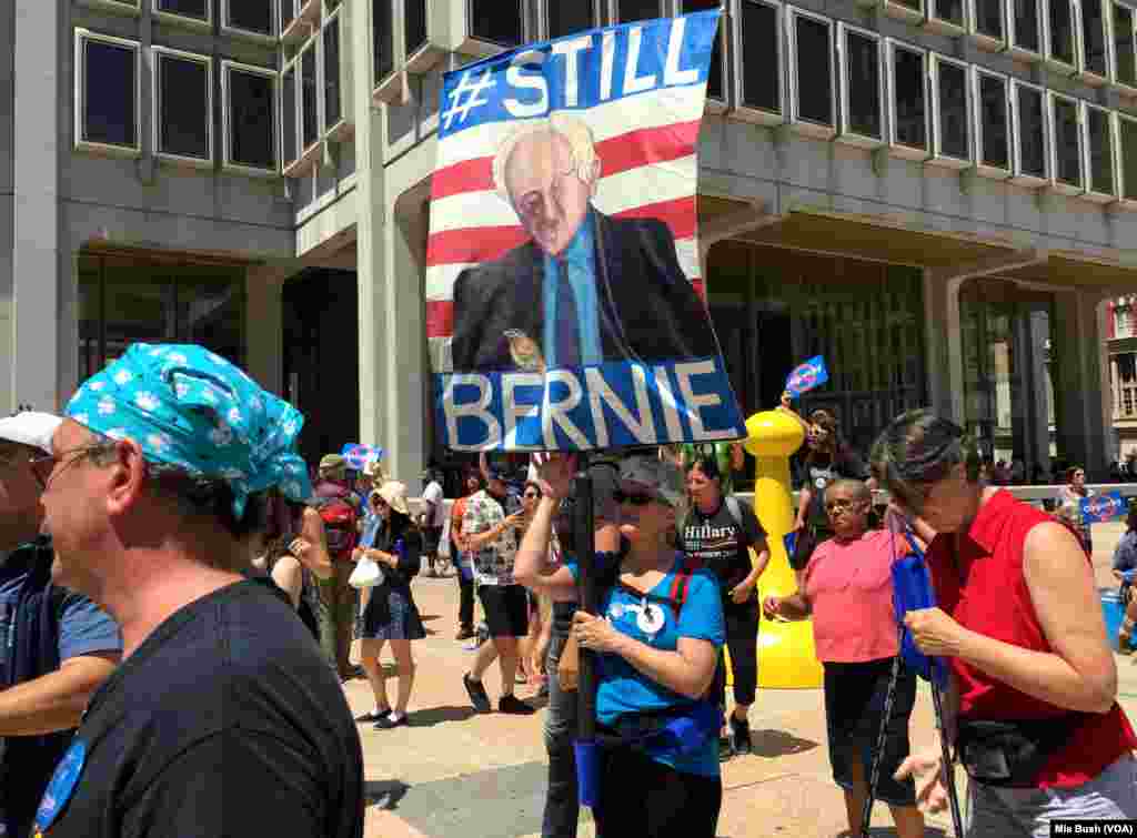 Bernie Sanders protesters march outside of the Pennsylvania Convention Center on the third day of the Democratic National Convention in Philadelphia, July 27, 2016 (Mia Bush/VOA)