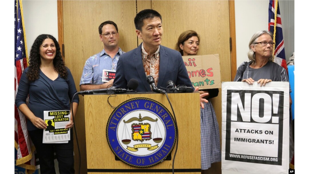 FILE - Hawaii Attorney General Douglas Chin speaks in Honolulu, about President Donald Trump's travel ba, June 30, 2017.