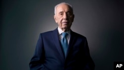 In this Monday, Feb. 8, 2016 photo, Israel's former President Shimon Peres poses for a portrait at the Peres Center for Peace in Jaffa, Israel. (AP Photo/Oded Balilty)