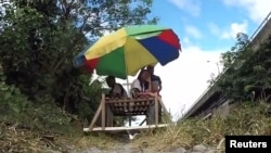 Many of Manila's trolleys, as the carts are known, are fitted with colorful umbrellas for shade from the sun and can seat up to 10 people each.