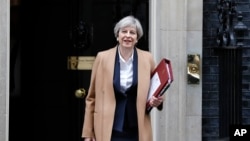 PM Inggris Theresa May memulai proses resmi Inggris keluar dari Uni Eropa dalam pidato di parlemen, Rabu 29/3 (foto: dok).