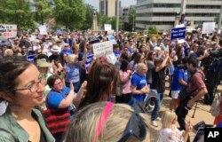 Protesters are seen gathered outside the state Capitol building on April 14, 2017, in Little Rock, Arkansas, to voice their opposition to the state's planned executions. Since 1973, 1,449 executions have been carried out in the United States. The numbers have been in steady decline in recent years, decreasing to 20 executions in 2016.