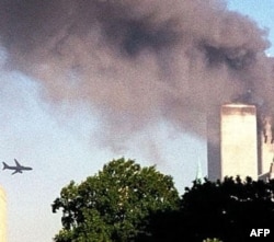 A second hijacked plane flies toward the World Trade Center